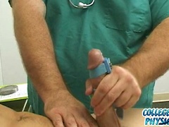 Cute college boy gets jerked off by Dr. Dick.