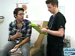College boy gets down to his underwear in the doctor's office.