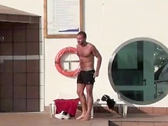 Man looks through glass door